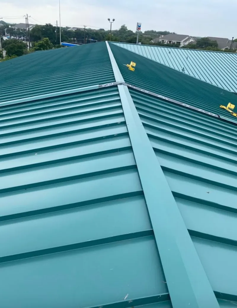 Green commercial metal roof ridge and valley for Metal Roof Repair in New Ulm